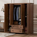 Freestanding 4-Door Wardrobe Armoire with 2 Drawers and Hanging Rods for Clothes Storage