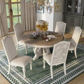 Caelum 7-Piece Round Dining Set with White Fabric Upholstery by The Gray Barn