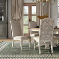 Caelum 7-Piece Round Dining Set with White Fabric Upholstery by The Gray Barn